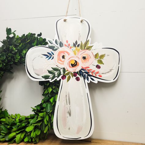 Our Floral Cross Door Hanger is a beautiful piece of art - featuring a cross with flowers - hand drawn by our resident artist and printed in-house. At 16" x 20", its unique design will add a touch of elegance to any home. 16" x 20" Floral Door Hanger, Spring Door Hanger Ideas, Easter Cross Crafts, Spring Door Hangers Wooden, Cross Painting Ideas, Painting On Door, Christian Door Hangers, Easter Cross Painting, Cross Door Hanger Ideas