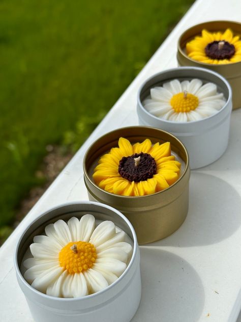 Introducing the new soy wax candles available in white jars for Daisy and golden jars for Sunflower, adding elegance to your home decor. The daisy candle exudes the soothing aroma of chamomile, while the sunflower candle radiates a refreshing herbal scent. Illuminate your space with the gentle warmth and enchanting fragrances of nature. Customize your candle with a personalized sticker for a unique and meaningful touch. *Price is for one candle. *Candle size is 65mm x 45mm Daisy Candle, Sunflower Candle, White Jar, Silicone Candle Molds, One Candle, Candle Sizes, Candle Molds, Diy Candles, Crafts Sewing