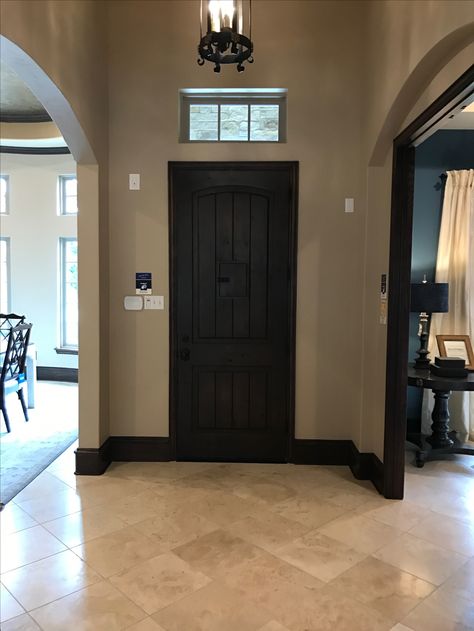 Charcoal Baseboards And Trim, Tan Walls Dark Trim, Light Trim Dark Walls, Black Trim Tan Walls, Home Color Schemes Interior With Dark Wood, Paint Colors With Dark Walnut Trim, Dark Gray Walls With Black Trim, Taupe Walls Black Trim, Beige Wall Black Trim