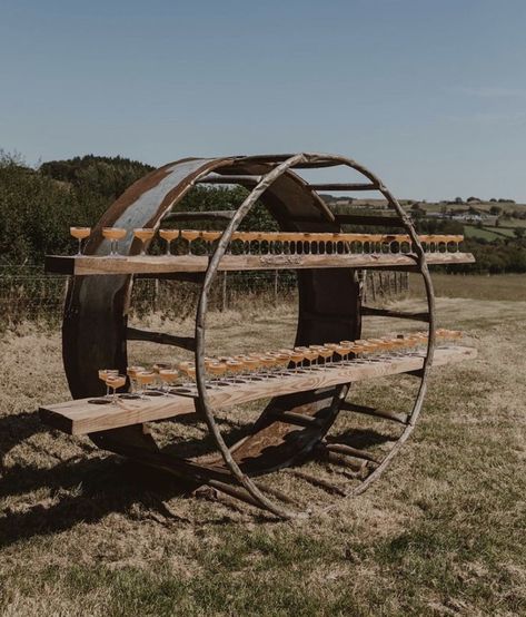 Farm Wedding Seating, Hay Feeder Wedding Arch, Hay Ring Ideas, Farm Themed Wedding Ideas, Bale Feeder Wedding Arch, Round Bale Feeder Wedding Arch, Wedding In A Pasture, Country Themed Wedding Decorations, Western Tent Wedding