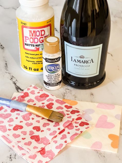 How to Create Decoupage Bottle Art - My Family Thyme Decopauge Wine Bottles With Napkins, Paint Wine Bottles Ideas, Bridal Crafts Diy, Diy Painted Bottles Ideas, Paper Mache Wine Bottles, Painting A Wine Bottle, Decoupage Wine Glasses, Mod Podge Champagne Bottle With Napkins, Napkin Wine Bottle Decoupage Ideas