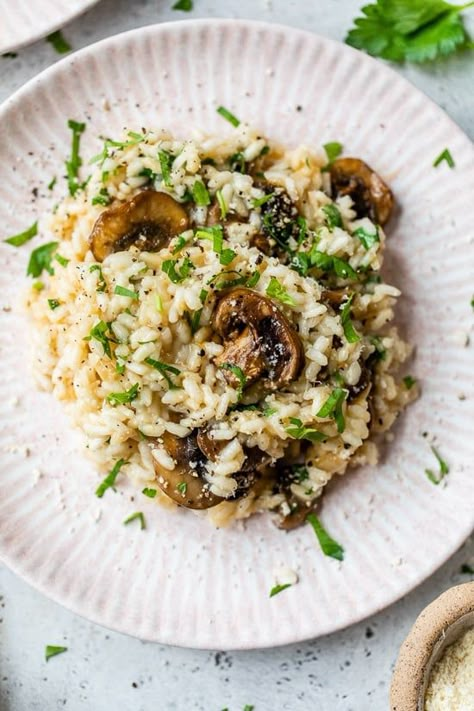 Mushroom Risotto is creamy Italian rice dish made with Arborio rice and loaded with mushrooms. It takes time to cook, but so worth the wait! #risotto #mushroom Mushroom And Pea Risotto, Italian Rice Dishes, Spinach Parmesan, Italian Rice, Parmesan Risotto, Wilted Spinach, Rice Dish, Mushroom Risotto, Risotto Recipes