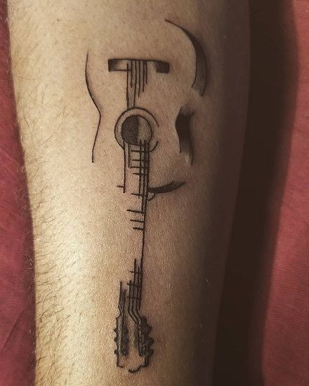 Captivating Guitar Tattoos For Ladies Guitar Inspired Tattoos, Ukulele Tattoo, Ryan Tattoo, Tattoos For Ladies, Guitar Tattoos, Ampersand Tattoo, Acoustic Guitar Tattoo, Sparrow Tattoo Design, Cover Up Tattoos For Men