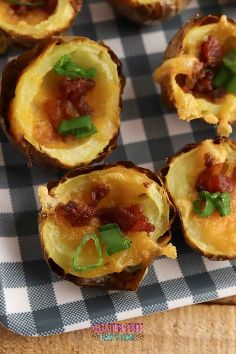 If you're searching for the best gluten free party food, you have to try these easy mini potato skins! Learn how to use your air fryer or oven to bake mini yukon gold potatoes, then fill them with cheese and bacon to make these amazing snacks with these step by step instructions. They're the perfect recipe for feeding a crowd for any party -- from the Super Bowl to New Year's Eve! Potato Skins Air Fryer, Mini Potato Skins, Yukon Gold Potato, Amazing Snacks, Gluten Free Party Food, Gluten Free Party, Potatoe Skins Recipe, Entertaining Food, Mini Potatoes