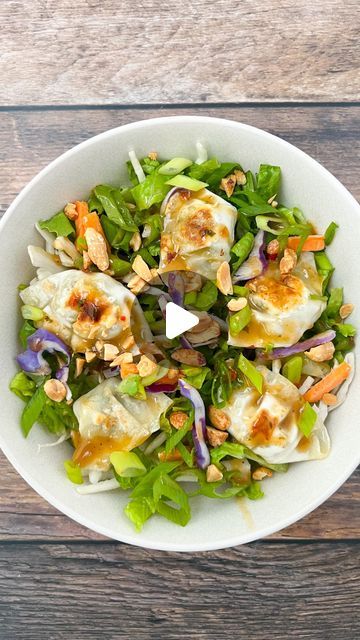 Stephanie | healthy balanced recipes | fun food on Instagram: "🥟MINI WONTON SALAD🥟

I love a salad with a peanut dressing, but was looking for something a little different than my usual chicken on top. I decided to add these mini frozen wontons (which I get at @costco ). They are  @bibigousa brand and are cilantro chicken flavor. They are so good and bite sized so they are just perfect for a salad! I love the contrast of the cool and crisp veggies with the warm wontons. You can use your favorite store bought dressing or I’ve included one of my favorites here too! I do love the Asian Spicy Peanut Dressing from @traderjoes if you need a store bought idea! Add chicken or shrimp for more protein! 

Coleslaw Mix
Thinly Sliced Romaine Lettuce
Cucumber
Sliced Scallion Greens
Mini Wontons
Choppe Chicken Wonton Salad, Wonton Salad Recipe, Wonton Salad, Frozen Wontons, Spicy Peanut Dressing, Balanced Recipes, Chicken Wontons, Cilantro Chicken, Peanut Dressing