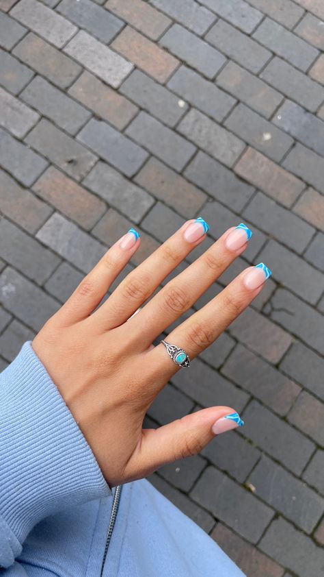 A picture of a hand with acrylic nails set. Tips are medium blue with light blue wavy lines. Body of nail is a shiny flesh colour Ocean French Tip Nails, Nail Inspo For Summer, Wavy Design, Short Acrylic, Tip Nails, Short Acrylic Nails Designs, Short Acrylic Nails, French Tip Nails, Nails Designs