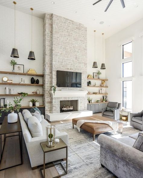 Home Decor And Interior Design on Instagram: "So many different views of this perfect Great Room. If the kitchen is the heart of the home, then this Great Room is the center of the home. - - Everything branched off this one space. This fireplace design has so many different details to notice. Take some time and notice the layers of texture between the precast material and the stone, with the sides done in a painted brick. Also, notice the levels of how these were layered on top of each other. T Fireplace With Cabinets, Modern Apartment Design, Fireplace Shelves, Open Plan Kitchen Living Room, Fireplace Built Ins, Southern Home, Design Your Home, Living Room With Fireplace, Fireplace Design