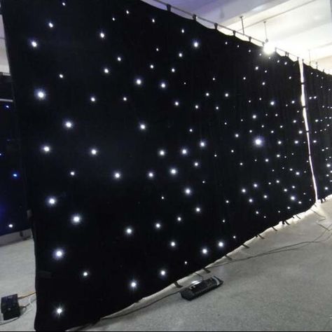 Making a starlight curtain Company Event Ideas, Stellar Vbs 2023, Star Curtains, Christmas Concert Ideas, Christmas Stage Design, Stellar Vbs, Prom Backdrops, Stage Curtains, Star Lights On Ceiling