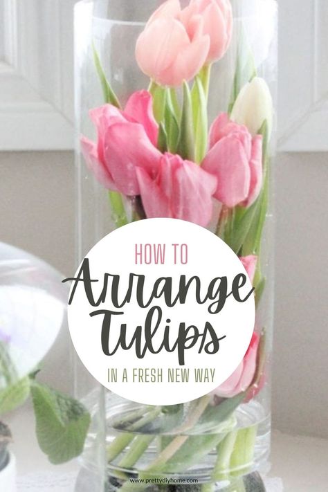 Easy how to for arranging tulips inside a tall vase. This tulip arrangement is dramatic a little bit unique and amazing for Spring! Flowers Arrangements Simple, Spring Flower Arrangements Diy, Tulip Arrangements, Tulpen Arrangements, Tulip Arrangement, Do It Yourself Decoration, Diy Frühling, Easy Flowers, White Floral Arrangements