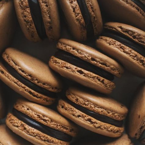 Delicious malty chocolatey macaron shells with a delicious dark chocolate ganache. This is your ticket to macaron heaven. Academia Themed Party, Dark Academia School Aesthetic, Brown Macarons, Dark Academia Birthday, Dark Academia Food, Academia Food, Oreo Macaron, Macaroon Filling, Academia Wedding