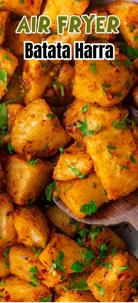 This air fryer batata harra recipe is a spin on a classic Lebanese side dish, needing only a fraction of the excess oil! Crisp russet potatoes get a delicious makeover with a lemony, garlicky sauce with the perfect hint of spice. These spicy Lebanese potatoes are the perfect side for homemade shish tawook skewers or air fryer chicken shawarma, and they taste even better with homemade toum garlic sauce! Lebanese Garlic Potatoes, Batata Harra Recipe, Shawarma Potatoes, Air Fryer Russet Potatoes, Toum Garlic Sauce, Lebanese Potatoes, Potato Recipes Air Fryer, Batata Harra, Shish Tawook