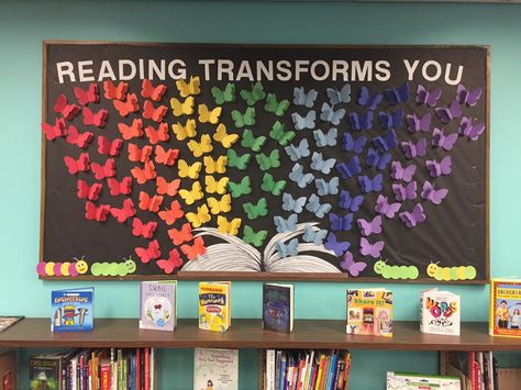 May Library Bulletin Board Ideas, Library Display Boards, End Of Year Library Bulletin Board Ideas, Pride Display Library, Library Bulletin Board Ideas, Library Spring Displays, Spring Book Display Libraries, March Is Reading Month Bulletin Board, Butterfly Bulletin Board