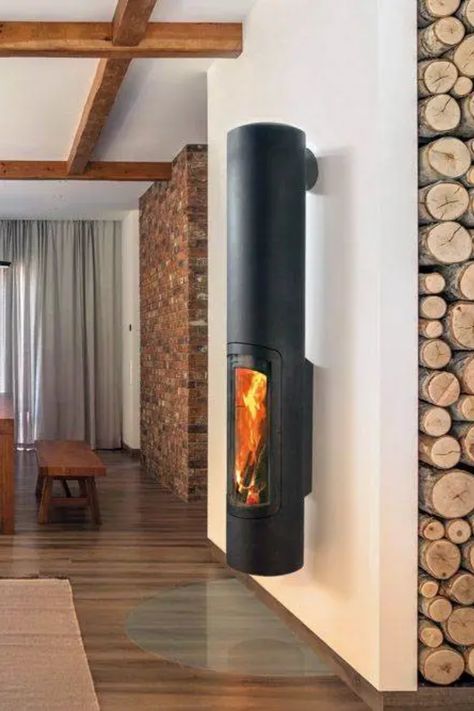 wall hanging unique fireplace in a modern home free hanging wall fireplace home Inso fireplace Inspo wood burning stove Modern Woodburner, Focus Fireplaces, Small Wood Burning Stove, Bedroom Seating Area, Bedroom Seating, Forging Metal, Stove Fireplace, The Fireplace, Stone House