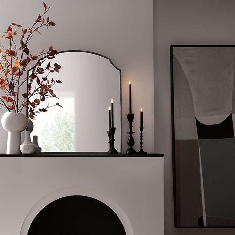 Faux Rust Leaf Branch 66" + Reviews | Crate & Barrel Tapered Candle Holders Decor, Candle Holders Black, Arch Mantle Mirror, Mirrors For Mantel, Arch Mantel Mirror, Unique Mantle Decor, Black Mantel Decor, Mirror For Above Fireplace, Black Candlesticks On Mantle