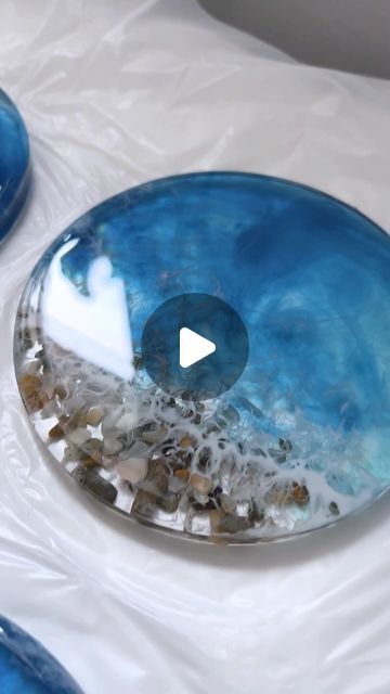 Craft Resin Epoxy - The Clear Choice for Artists & Crafters on Instagram: "🌊✨ DIY Ocean-Inspired Resin Coasters Tutorial! 

In this video, our talented artisan @anastasia_kate_art takes you through a step-by-step tutorial on creating stunning ocean-themed coasters using 1:1 @craft.resin 

🔹 Step 1: She starts by mixing the resin in equal parts. 
🔹 Step 2: Next, she pours the resin into the mold and adds decorative elements like small stones for that perfect beachy vibe. 
🔹 Step 3: A touch of white pigment is added to create beautiful wave effects.

Watch till the end to see the breathtaking final result! 🌟 

Use code ANASTASIA10 to get 10% off at craft-resin.com 

Don’t forget to like and share if you love these coasters as much as we do! 💙

 #ResinArt #DIYCoasters #CraftResin #Ocean Small Epoxy Projects, Diy Resin Coasters, Beach Coasters, Craft Resin, Ice Resin, Pink Ocean, Resin Coasters, Diy Coasters, Instagram Diy