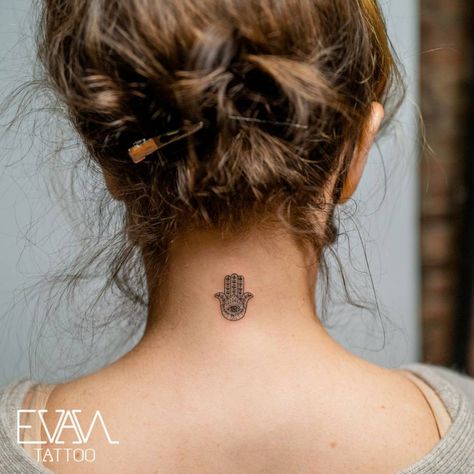 Hamsa tattoo located on the back of the neck. Red Hamsa Tattoo, Hamsa Tattoo Back, Hamsa Tattoo Back Of Neck, Hamsa Chest Tattoo, Hamsa Neck Tattoo, Evil Eye Tattoo Back Of Neck, Hand Of Hamsa Tattoo, Hamsa Evil Eye Tattoo, Hamsa Tattoo Men