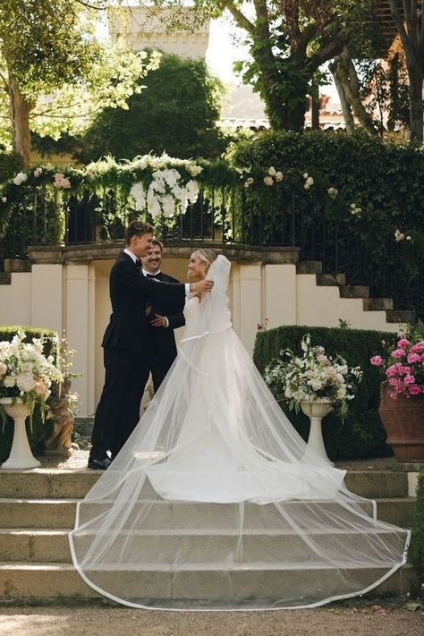 ✨ Our wedding day was pure magic ✨ I feel like the luckiest bride. I walked down the aisle in my classic Hollywood wedding dress, surrounded by luxury florals and love. 💕 Our classic wedding theme with a touch of glam made the day unforgettable. If you want classic wedding ideas, bridal bun inspo, glam bridal makeup looks, and a big dance party reception, tap to see more of our California wine country wedding! | strapless wedding dress Bride Walking Down The Aisle Photos, Walking Down The Aisle Photos, Classic Hollywood Wedding, Down The Aisle Photos, Hollywood Wedding Dress, Classic Wedding Theme, Classic Wedding Ideas, Glam Bridal Makeup, Delaney Childs