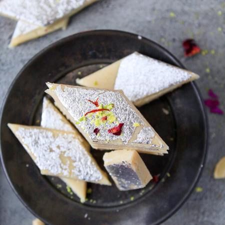 Kaju Katli Recipe | Kaju Barfi (Easy, No-Cook Recipe) Badam Katli, Kaju Barfi, Barfi Recipe, Nut Rolls, Burfi Recipe, Rose Flavored, Blanched Almonds, Indian Sweet, Indian Desserts