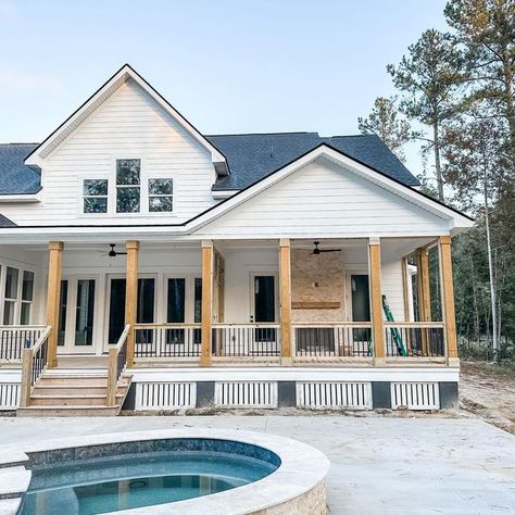 s h a r a + d a v e on Instagram: "We are all about the backyard this week! Pool’s getting filled and porch railings and screens are going up. I just can’t wait for our second summer 🌞 so we can enjoy the pool a couple of times (don’t worry, it’s heated!), and also for chilly nights on our back porch in front of the fireplace!! 🔥 Which would you rather do? Swim or snuggle? 🤍 . . . #farmhousedecor #customhome #southernfarmhouse #farmhousesofinstagram #farmhouseinspired #homesweethome #homeso Modern Farmhouse Porch Railing, Front Porch Railing Ideas Farmhouse, Front Porch With Railing, Porch Railing Ideas Farmhouse, Southern Farm House, Front Porch Railing Ideas, Porch Railing Ideas, House With Front Porch, Modern Farmhouse Porch