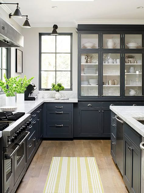 We love the dark cabinets in this modern kitchen space: http://www.bhg.com/kitchen/styles/country/country-kitchen-ideas/?socsrc=bhgpin063014substanceandstyle&page=14 Kitchen With Black Cabinets, Dapur Moden, Model Dapur, Серая Кухня, Kabinet Dapur, Herringbone Backsplash, Grey Kitchens, Black Cabinets, Grey Kitchen