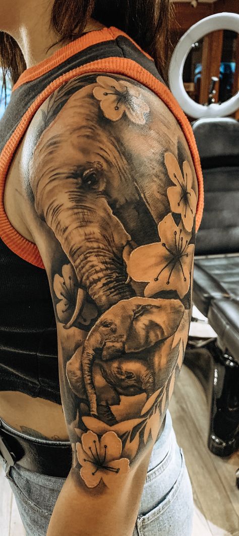 Elephant Quarter Sleeve Tattoo, Elephant And Rose Tattoo Design, Elephant And Roses Tattoo, Elephant And Clock Tattoo, Elephant Leg Sleeve Tattoo, Tattoo Ideas Female Sleeve Elephant, Elephant Clock Tattoo, Upper Arm Elephant Tattoos For Women, Half Sleeve Tattoos For Women Upper Arm Elephant