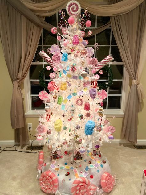 I took inspo from @Colorpopmakeup candy land theem an put into my christmas tree #candylandchristmas #colorpop #pastel #candy Candy Christmas Tree Collar, Candy Tree Toppers, Candy Tree Skirt, Pastel Candy Land Christmas, Candyland Themed Christmas Tree, White Candy Christmas Tree, Pastel Candy Christmas Tree, Christmas Candy Land Theme, Sweets Christmas Tree