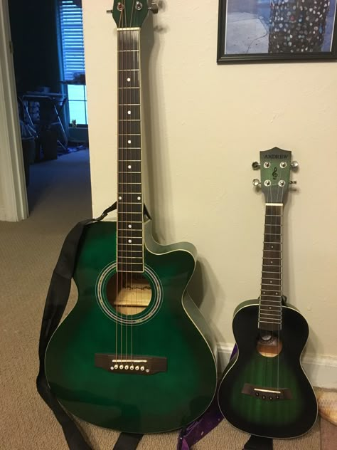 They are not related but they match Green Acoustic Guitar Aesthetic, Green Guitar Acoustic, Matching Guitars, Dark Green Guitar, Guitar Art Diy, Leo Ashton, Painted Ukulele, Green Guitar, Guitar Jewelry