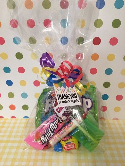 "Birthday Party Favor Loot Bags! Pre Filled Goodie Bags! Each bag contains: 1 package of fun dip (flavor varies) 1 bright colored plastic toy (spring toy pictured) 1 lollipop (flavor varies) 1 piece of taffy (flavor varies) 1 piece of bubblegum 1 package of smarties Each bag is tied with bright colored curling ribbon with a paper tag that says \"thank you for coming to my party\" **Unfortunately tags can not be personalized. Orders will ship within 3-5 business days Price is $4.50 per bag" 1st Birthday Thank You Gifts Favors, Small Goodie Bags Ideas, Candy Treat Bags Ideas, Birthday Loot Bag Ideas, Candy Bags Ideas Birthday, Birthday Goodie Bags Ideas, Goody Bag Ideas For Kids, Loot Bag Ideas For Kids, Goodies Bag Ideas For Kids Birthday