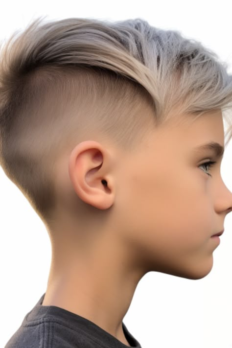 The long top with an undercut is a haircut that allows you to flaunt your lengthy locks. Adding a skin fade on the sides gives it a contemporary touch while still preserving the classic appeal of the long top. Click here to check out more trendiest boys haircuts for school. Boy Hair Cuts Long On Top, Boys Undercut Hairstyle, Boy Haircut Long On Top Short On Sides, Boy Haircuts Long On Top, Boys Undercut Hairstyle Long, Boys Hair Long On Top Short On Sides, Boys Haircut Trendy Long, Cute Boy Haircuts, Boys Hair Cuts Longer On Top