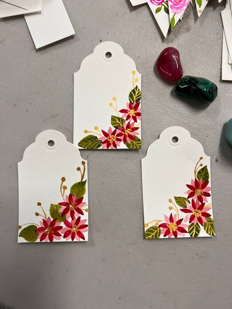 Tag your holiday presents with these handmade tags and embellishments. Personalize them to your requirement and make your presents even more special. $1.50 per tag Hand Made Christmas Gift Tags, Christmas Watercolor Gift Tags, Christmas Tags Watercolor, Painted Christmas Tags, Watercolour Christmas Tags, Postpartum Art, Tags Ideas Handmade, Christmas Gift Tags Stampin Up, Watercolor Christmas Tags