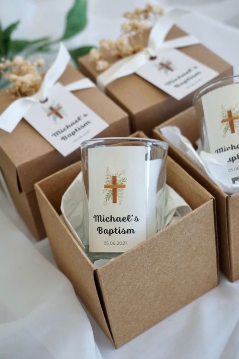 "Welcome to our shop! Celebrate the special occasion of a baptism with our unique and personalized souvenirs for guests. Our Baptism Party Glass Candle Favors come in a beautiful box, making them the perfect keepsake for your loved ones. These custom christening favors are designed to make your event memorable. They feature a glass candle with a personalized label that includes the name of the child, the date of the baptism, and a special message. These favors are also great for First Communions Confirmation Party Ideas For Boys, Diy Baptism Favors, Baptism Favors Diy, First Communion Favors Ideas, Baptism Giveaways Ideas, Baptism Souvenir Ideas, Christening Souvenir Ideas, Baptism Favor Ideas, Baptism Recuerdos