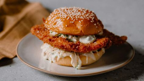 Crumbed barramundi burger with lime and black pepper slaw Pepper Slaw, Tartare Sauce, Fish Burger, Gochujang Sauce, Sbs Food, Jewish New Year, Homecooked Meals, Cabbage Slaw, Jewish Recipes