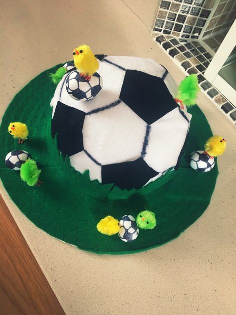 Football themed Easter bonnet Football Easter Bonnet, Easter Hats For Boys, Boys Easter Bonnet, Easter Hat Parade Ideas, Upcycled Hats, Boys Easter Hat, Easter Egg Competition Ideas, Easter Bonnet Ideas, Easter Bonnets For Boys