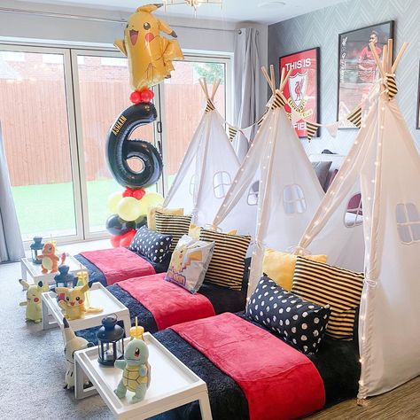 A funky 'Pokemon' theme sleepover party set up. Check out this theme as well as some other designs showing how you can create your own copyright compliant sleepover parties with originality, creativity and style. Pokemon Sleepover, Pokemon Sleepover Party, Teepee Sleepover Party Ideas, Harry Potter Teepee Sleepover, Preppy Teepee Sleepover, Teepee Tent Sleepover Party Diy, Teepee Sleepover Party Themes, Boy Sleepover, Sleepover Room