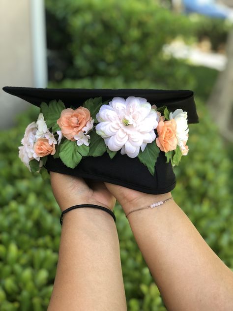 Grad Cap Flower Crown, Flower Crown Graduation Cap, Flower Grad Cap, High School Graduation Cap Designs, Flower Graduation Cap, Crown Fashion, College Grad Cap Ideas, Grad Cap Decorated, Ames Iowa