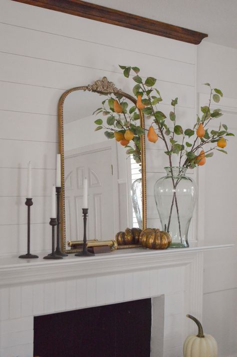 Fireplace Mantel Mirror Decor, Mirrors Over Sideboards, Vintage Mirror Fireplace, Gold Mirror On Fireplace Mantel, Black Candle Sticks On Mantle, Black And Gold Mantle Decor, Black Mirror Mantle Decor, Black Candle Stick Decor Ideas, Vintage Mirror Decor Ideas