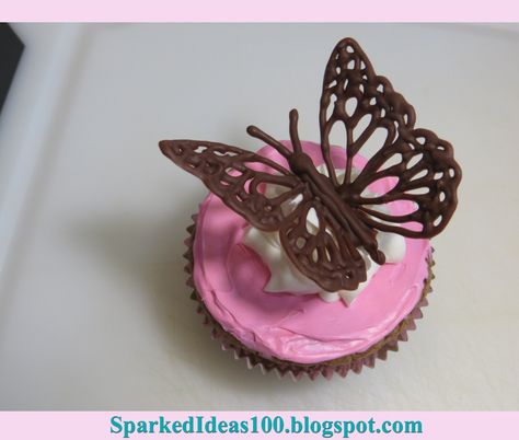 A pretty butterfly chocolate topper for cupcakes or a cake. The steps are on my blog but I haven't figured out a perfect technique yet. #chocolate #cake decorating #cake decorations #cake toppers #cupcakes #cupcakes #cupcake decorating Stiff Buttercream Frosting Recipe, Chocolate Butterfly, Chocolate Template, Chocolate Cake Toppers, Chocolate Toppers, Salted Caramel Chocolate Cake, Chocolate Butterflies, Butterfly Cupcake Toppers, Cupcake Toppers Template