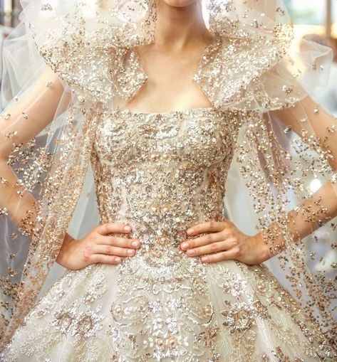 Sparkly wedding dresses never looked so good! We rounded up our favorite styles from ballgowns to capelets to boho chic sequins, and these 22 bridal style ideas might just have you re-evaluating your glitter game for the wedding. Only way to go is up! Check out these Red Carpet looks on #ruffledblog Murad Zuhair, Wedding Dress Ruffle, Zuhair Murad Bridal, Bohemian Style Gown, Gown Ideas, Beach Wedding Attire, Sparkly Wedding Dress, Bridal Skirts, Sparkly Wedding