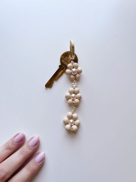 Grown Up DIY Bead Weaving Keychain: Wood & Pearl Floral — Really Pretty Good Bead Key Chains Aesthetic, Simple Bead Keychain, Diy Pearl Keychain, Diy Bead Keychain How To Make, Beaded Key Chains Diy, Charm Crafts Diy Projects, Pearl Keychain Diy, Wood Bead Keychain Diy, Diy Bead Keychain Ideas