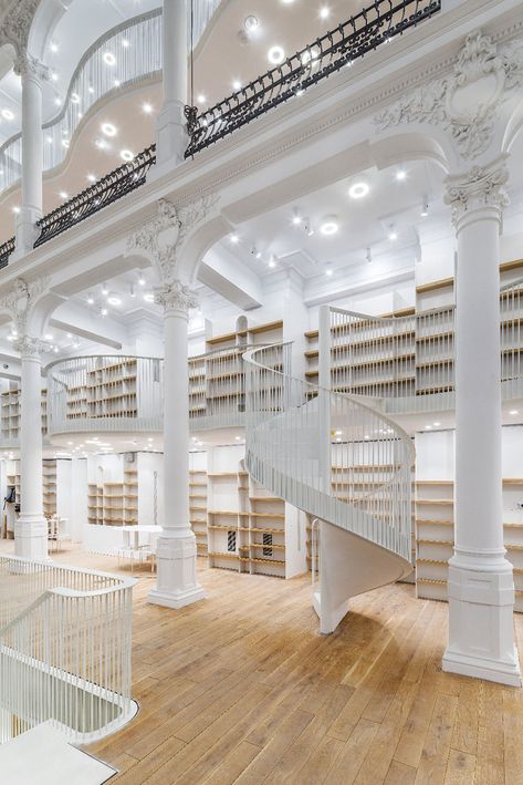 carousel-of-light-library-bucharest-14 Romania Travel, Local Architecture, Beautiful Library, Dream Library, Bucharest Romania, Spiral Staircase, Hardwood Flooring, Architecture Firm, Macedonia