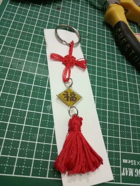 Chinese good luck charm using shrink plastic #diy #shrinkplastic #goodluck #tassle Plastic Charms, Plastic Art, Luck Charm, Shrink Plastic, Luck Charms, Good Luck, Art Ideas, Charms, Band