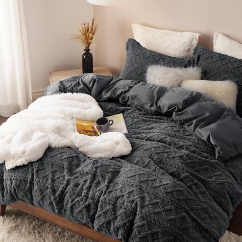 PRICES MAY VARY. Fluffy & Soft: The front utilizes extremely fluffy shaggy Sherpa fabric and the reverse is exquisite velvet fabric. This 100% polyester duvet cover set instantly brings a welcoming warmth and adds a dose of softness. Glamorous Look: A tufted cable pattern pops up across this uniquely made fluffy cover set, giving on a subtle sense of depth. The gentle sweet hue of the bedding cover set adds an extra layer of style to coordinate your room with an elegant feeling. Clever Design: S Dark Grey Bedspread, Dark Grey Duvet Cover Bedroom, Black Bed Sets, Gray Christmas Bedroom, Moody Master Bedrooms Decor Cozy, Cute Bedding Sets, Grey Duvet Cover Bedroom, Cozy Room Colors, Winter Bedding Cozy Bedroom