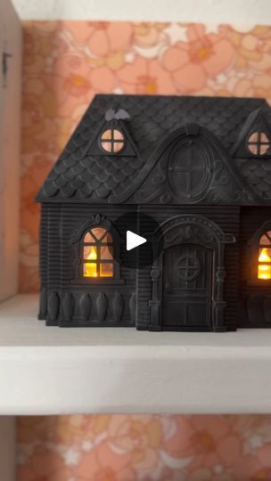 3.3K reactions · 321 shares | This spooky craft is fitting for a fall Friday the 13th 🖤✨

I got the dollhouse, light plug-in and tea lights from dollar tree. For haunted house vibes I spray painted the house flat black. To give it that old, moody feel I brushed on white sidewalk chalk. I cut a whole for the nightlight and used glue and tape to secure it in place. This was so easy and affordable too. I can’t wait to try some more spooky season DIY’s with these houses. 

I can imagine Wednesday Addams living here! 🕷️ 

Thanks for the inspo @txmamashopsndiys 

#halloweendiy #hauntedhouse #dollartreediy #diycrafts #dollartree #diydecor #spookyseason #fridaythe13th #wednesdayaddams #diyhalloween #craftideas #halloweencrafts #halloweenideas #halloweeninspo #nightlights #dollhouse #dollhousedec Mini Haunted House Diy, Diy Haunted House Dollhouse, Haunted Dollhouse Diy Ideas, Dollar Tree Haunted House, Mini Haunted House, Fall Friday, Spooky Craft, Haunted House Diy, Eyes Without A Face