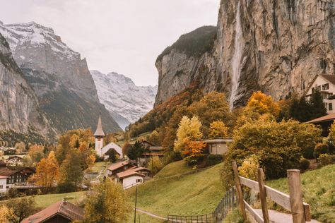 The colors of Autumn on a day trip to Lauterbrunnen Best Places In Switzerland, Swiss Village, Epic Backgrounds, Lauterbrunnen Switzerland, Switzerland Travel Guide, Places In Switzerland, Famous Waterfalls, Alpine Village, Colors Of Autumn