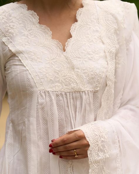 Elevate your wardrobe with our elegant White Self-Textured Lace Yoke Kurta set. Designed to perfection, this kurta comes with matching pants and an optional dupatta. The intricate self-textured lace yoke adds a touch of sophistication to your look. Perfect for any occasion, this set is a must-have for the fashion-forward woman. #sujatra #sujatraglobal #sujatrakurta #cottonkurta #cottonpants #lacekurtas #laceyoke #whitekurtaset #newarrivals Kurti Dupatta, White Kurta, Matching Pants, Kurta Set, Cotton Pants, Tunic Dress, Shirt Jacket, Jacket Dress, 10 Days