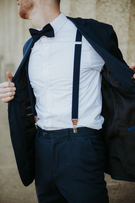 Navy is such a timeless wedding suit color. No better way to complement your grooms and groomsmen suits than matching bow ties and suspenders. With leather detailing and cotton woven blend , these make the perfect additional to your wedding! Suit Suspenders, Suit With Suspenders, Navy Groomsmen Suits, Casual Groom Attire, Groom Suspenders, Navy Suit Wedding, Navy Bow Tie, Groomsmen Suspenders, Outfit Navy