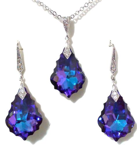 "Something blue purple bridal jewelry featuring Regency wedding vintage style Gatsby Art Deco bridal earrings and necklace in geometric shape dangles made of purple blue tone swarovski crystals in silver rhodium plated tarnish-resistant base. You may choose earrings only or earrings and necklace set. Earrings are about 1 5/8\" (3.7cm) including posts. Pendant is 1 1/4\" (3.5cm) with bail. Chain length is 17.5\" (45cm) as shown. * Limited stock. While stocks last only. View all something blue des Purple Turquoise Wedding, Regency Wedding, Bridal Party Earrings, Blue Bridal Earrings, Geometric Pendant Necklace, Bridal Party Jewelry, Swarovski Crystal Necklace, Blue Bridal, Party Earrings