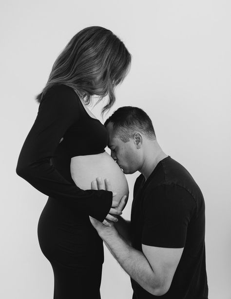 Maternity Photography Black And White Couple, Maternity With Husband Photo Shoot, Male Maternity Shoot Outfit, Black Shirt And Jeans Maternity Shoot, Black White Maternity Shoot, Maternity Shoot With Partner, Black And White Maternity Shoot At Home, White Wall Maternity Shoot, Maternity Pictures White Backdrop