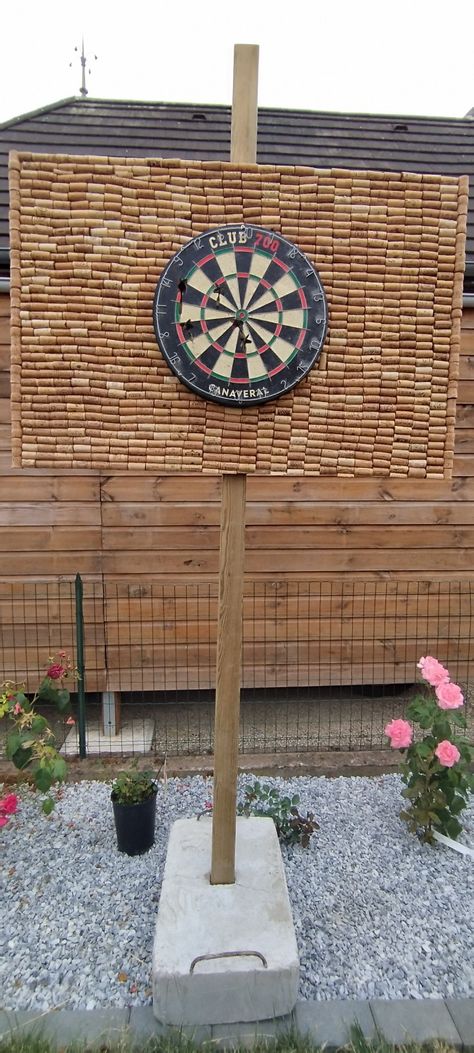 Dart board made of cork Diy Outdoor Dart Board, Outdoor Dart Board Ideas, Diy Dart Board, Outdoor Dartboard, Outdoor Dart Board, Cabin Games, Dart Board Wall, Austin House, Diy Yard Games