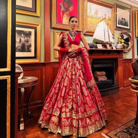 Hussain Rehar Couture on Instagram: "𝑪𝒍𝒊𝒆𝒏𝒕 𝑫𝒊𝒂𝒓𝒊𝒆𝒔💫   @kiran.malikofficial stuns in this red handwoven Banarasi lehenga! With a whopping hundred yards of flair, this lehenga is a true masterpiece. The exquisite craftsmanship is evident in the intricate lappa and gotta work that adorns every inch of this regal ensemble. The plain pure satin silk choli adds a touch of elegance, Dupatta is adorned with exquisite gotta work, it showcases the intricate beauty of traditional gotta techniques. Each stitch tells a tale of rich cultural heritage and impeccable craftsmanship. This dupatta is the epitome of elegance, adding a touch of regal allure to any bridal ensemble.  #hussainrehar #hussainreharofficial #bridalcouture #couture" Hussain Rehar, Client Diaries, Indian Outfits Lehenga, Gotta Work, Bridal Lehenga Red, Red Lehenga, Satin Silk, Bridal Lehenga, Bridal Couture